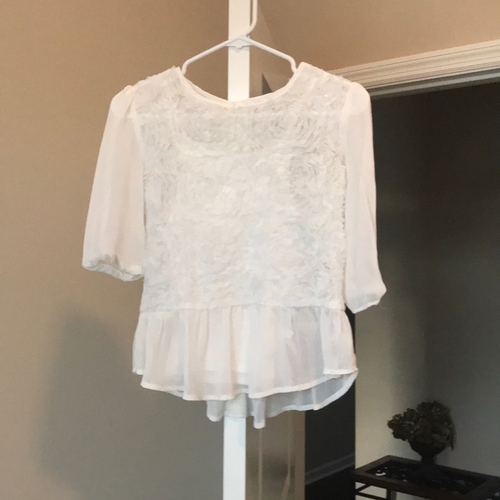 White, light weight blouse with floral detailing